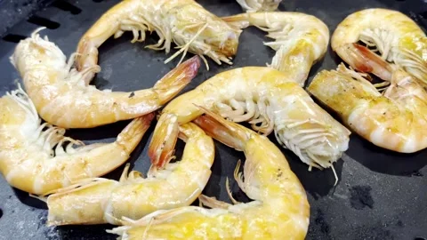 Close Up BBQ Shrimp Grilling on Hot Pan Stock Footage 340413402