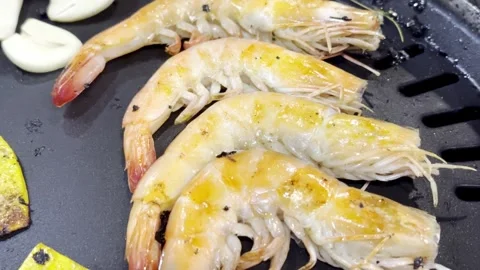 Close Up BBQ Shrimp Grilling on Hot Pan Stock Footage 340413414