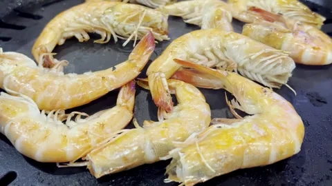 Close Up BBQ Shrimp Grilling on Hot Pan Stock Footage 340413419