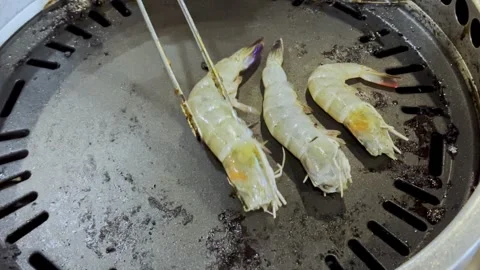 Close Up BBQ Shrimp Grilling on Hot Pan Stock Footage 340413581