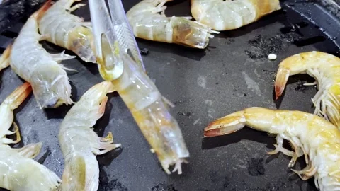 Close Up BBQ Shrimp Grilling on Hot Pan Stock Footage 340413600