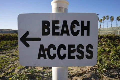 Close up on a beach access sign Stock Photos