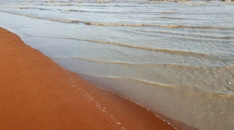 Close-up beach with gentle waves and clean sand. Stock Footage 50796943