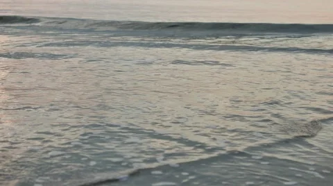 Close-up beach with gentle waves Stock Footage 50376297