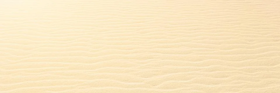 Close up on Beach Sand texture background for wallpaper and poster. Sandy beach 스톡 사진
