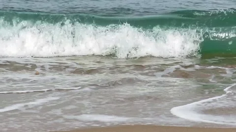 Close up beach sea waves. Beach coast gentle waves. Ocean waves on beach. Stock Footage 139875910