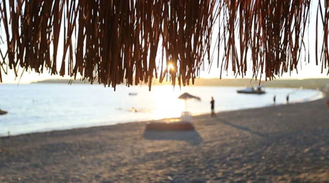 Close up beach umbrella waves on sandy beach Stock Footage 31271280
