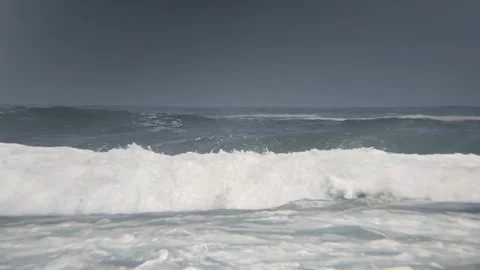 A close-up of beach waves using a telephoto lens Stock Footage 279713202
