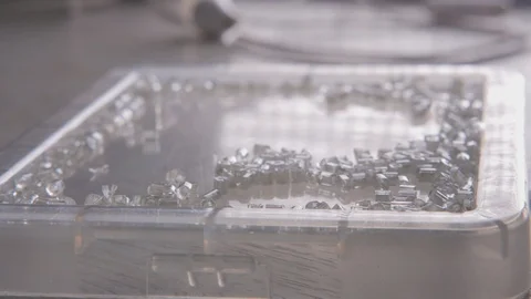 Close-up beads and sequins, of needle and thread, embroider pattern. Equipment Stock Footage 89928870