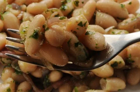 Close up on bean salad on fork Stock Photos