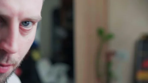 A close up of a bearded man appearing in front of camera Video stock 126157982