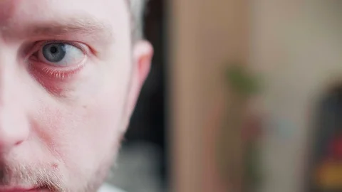 A close up of a bearded mans face. Different emotions Stock Footage 126158036