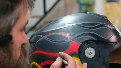 Close-up bearded master with mustache,bluetooth headset in ear airbrushing Vidéo 275399562