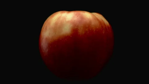Close-up, a beautiful apple in turning motion on a black background Stock Footage 175955772