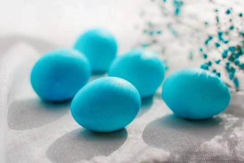 Close-up of beautiful blue Easter eggs. Easter decor. Selective focus Fotos Stock