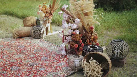 Close-up beautiful boho arch decoration on outdoor wedding ceremony. Floristic Stock Footage 228870863