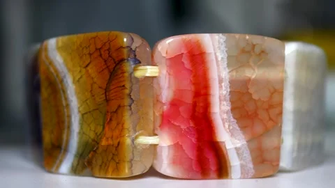 A close-up of a beautiful bracelet lying on a table, perfect for jewelry an.. Stock Footage 345168519