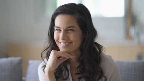 Close up of beautiful brunette looking at the camera and smiling Stock Footage 96675094