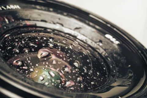 Close up beautiful Camera lens of drop water, white light. Background pattern Foto stock