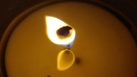 Close up of beautiful flickering candle flame Stock Footage 123130376