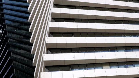 Close-up The beautiful geometric shape of two high-rise office buildings si.. Stock Footage 233700392