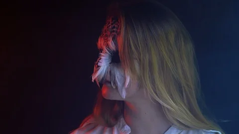 Close-up, Beautiful Girl with Owl Face Mime on Face Turns Head in Smoky Dark Stock Footage 88448053