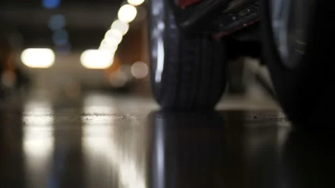 Close-up, beautiful legs in high heels fit the car. Girl get in the car. Parking Stock-Footage 100430448