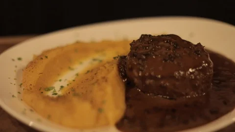 Close Up of Beautiful Meat with Puree Dish of Fancy Restaurant Stock Footage 129337705