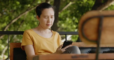 Close-up beautiful middle-aged asian woman face smiling sincere happy. Stock Footage 168128772