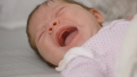 Close-up of a beautiful newborn baby's face Stock Footage 108522675