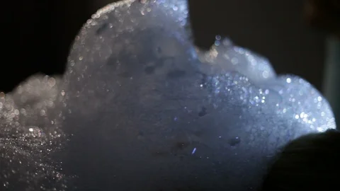 A close-up of a beautiful soapy foam in Turkish bath Hamam Stock Footage 115573558