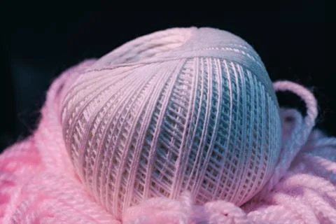 Close up beautiful tangle of thread in red and blue light on a dark backgroun Stock Photos