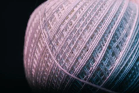 Close up beautiful tangle of thread in red and blue light background texture. Stock Photos