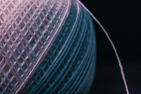 Close up beautiful tangle of thread in red and blue light background texture. Stock Photos