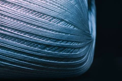 Close up beautiful tangle of thread in red and blue light background texture. Stock Photos