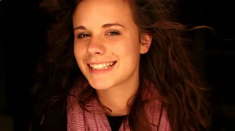 Close up of beautiful teen girl with hair blowing Stock Footage