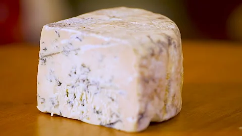 Close up. Beautiful texture of aged blue cheese. Aged soft blue cheese 스톡 동영상 93098082