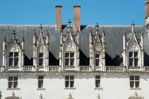 Close up of the beautiful windows in the upper part of Nantes castle Stock Photos
