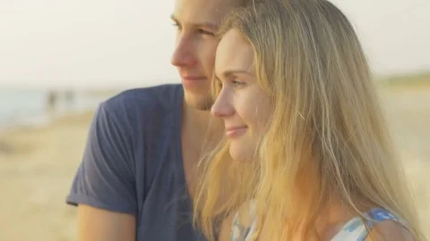 Close-up of beautiful young couple looking forward and dreaming Stock Footage 73781495