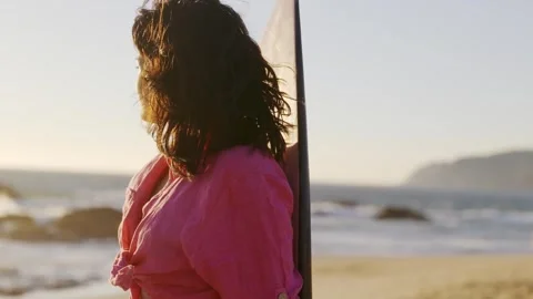 Close-up of the beautiful young lady, looking at the horizon in the ocean wind 스톡 동영상 245425514