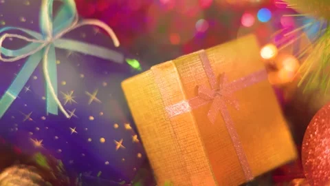 Close up of beautifully wrapped gift boxes lie on a colorful bright background. Stock Footage 322106822