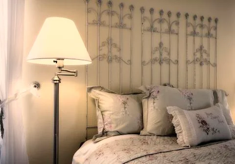 Close up on a bed in a bedroom Stock Photos