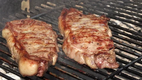 Close up on a beef steak 4K Stock Footage 130880010