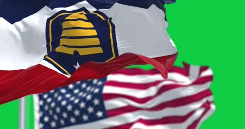 Close-up of the Beehive Flag flag of Utah waving isolated on green background Video stock 296062887