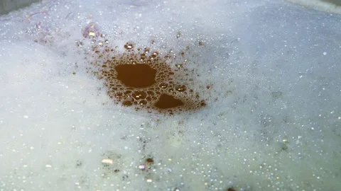 Close up of beer being brewed in a saucepan. home brewing process Stock Footage 140715413