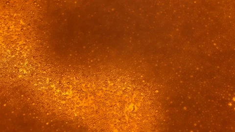 Close up of Beer Bubbles and Foam Movement Stock Footage 125482385