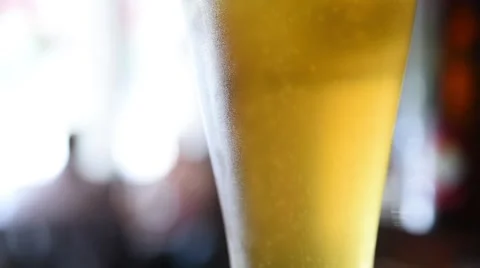Close-up beer bubbles in glass Stock Footage 66387780