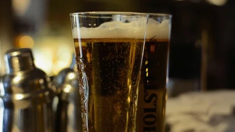 Close-up beer bubbles in glass Stock Footage 73131821