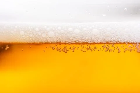 Close up of beer bubbles. Stock Photos