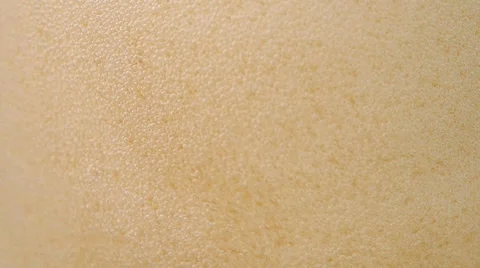 Close up of beer bubbles swirling in slow motion Vídeo Stock 34650383
